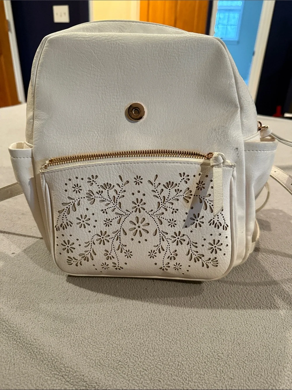 LC Lauren Conrad Kate Flap mini Backpack in Pearl w/Floral Laser-Cut